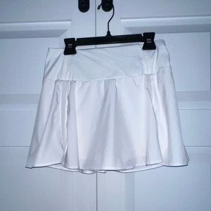 White tennis skirt.